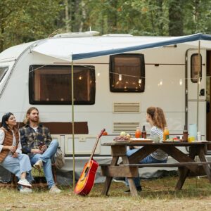 Friends Relaxing by RV Van